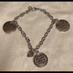 8” charm Bracelet with lobster clasp with four charms